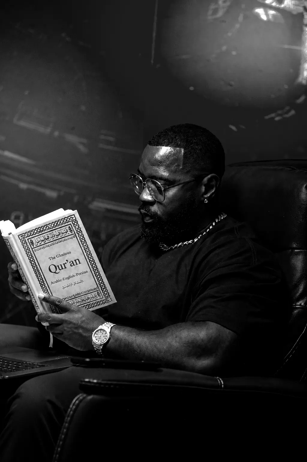 Mike Rashid King reading the Quran